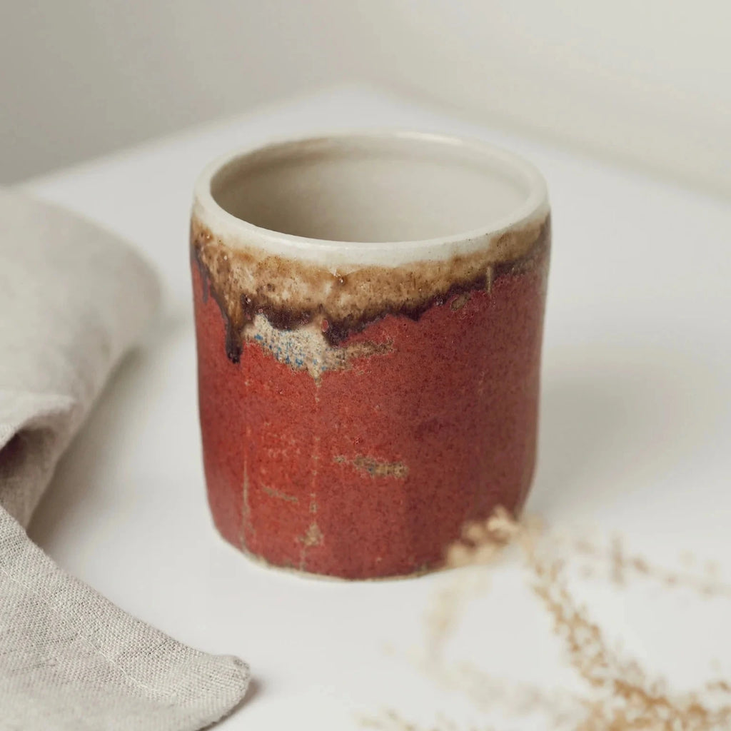 A Handcrafted Pink Ceramic Beaker from Charlotte Manser for sale at Mostyn