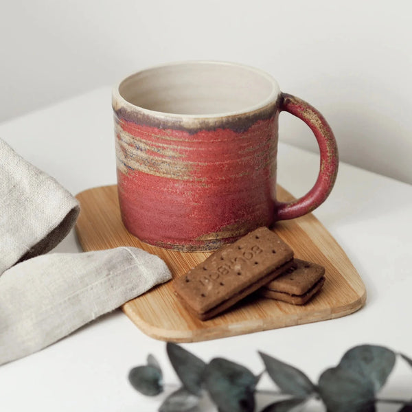 A Handcrafted Pink Ceramic Mug from Charlotte Manser for sale at Mostyn