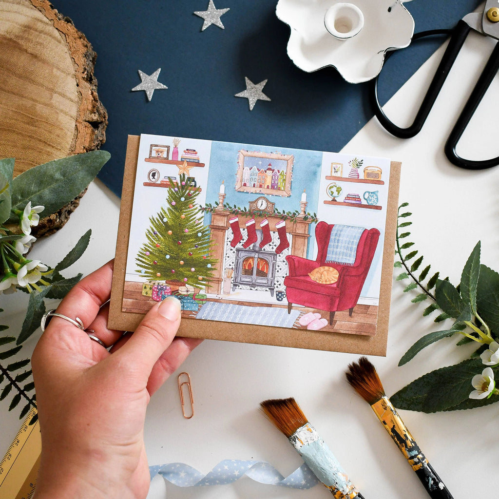 Cosy Fireplace Illustrated Christmas Card from Eleri Haf Designs for sale at Mostyn