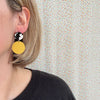 Cow Print and Mustard Stud Earrings from Deryn for sale at Mostyn