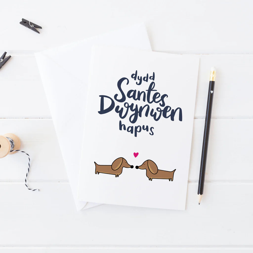 Dachshunds Dydd Santes Dwynwen Hapus Welsh Valentines Card from Draenog for sale at Mostyn