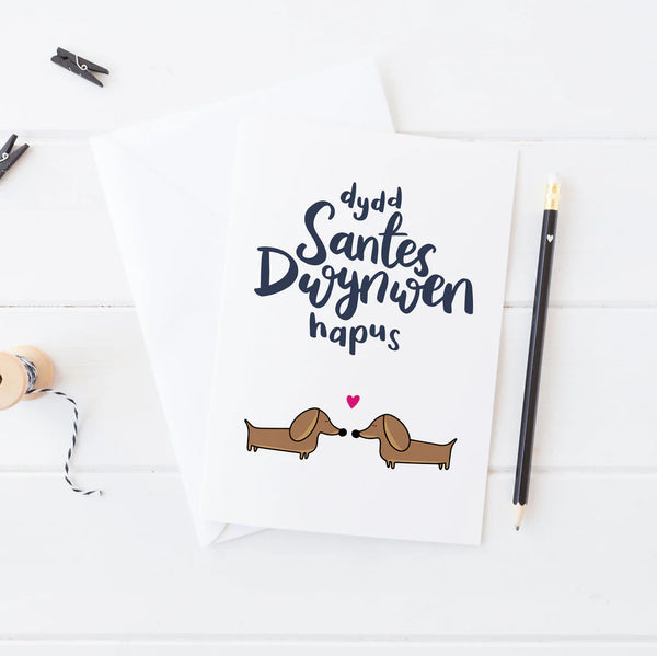 Dachshunds Dydd Santes Dwynwen Hapus Welsh Valentines Card from Draenog for sale at Mostyn