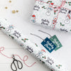 Snowmen Welsh Language Christmas Gift Wrap Set from Draenog for sale at Mostyn