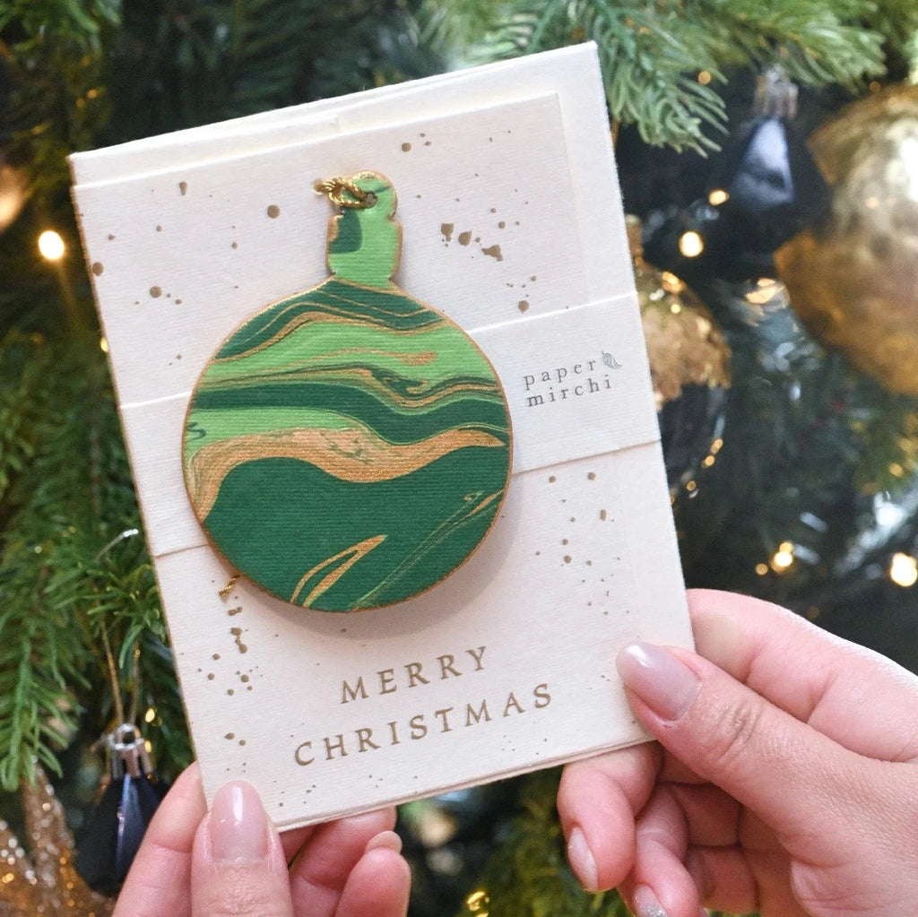 Emerald Bauble Hand Marbled Christmas Decoration Greeting Card from Paper Mirchi for sale at Mostyn