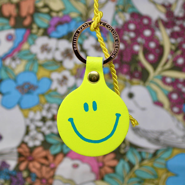 Feeling Lush Smilie Face Neon Yellow Leather Key Fob from ARK Colour Design for sale at Mostyn