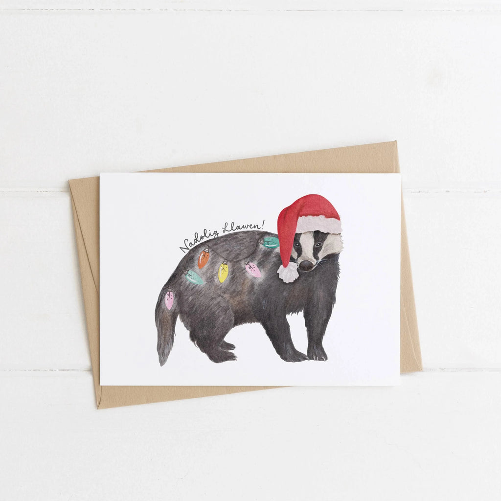 Festive Badger Welsh Christmas Card from Eleri Haf Designs for sale at Mostyn