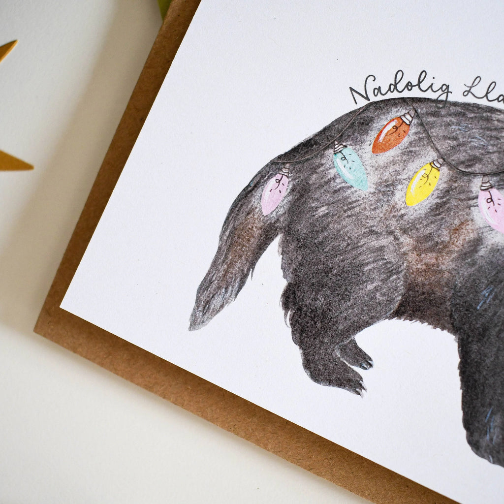 Festive Badger Welsh Christmas Card from Eleri Haf Designs for sale at Mostyn