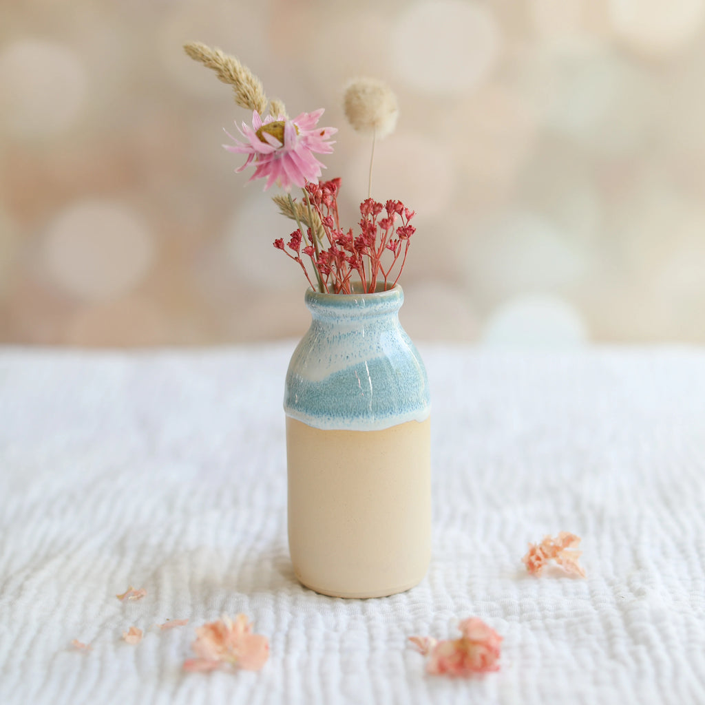 A Handcrafted Coast Blue Ceramic Milk Bottle Vase from Glosters Pottery for sale at Mostyn.