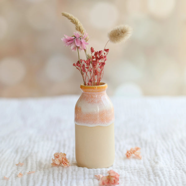 A Handcrafted Mustard Yellow Ceramic Milk Bottle Vase from Glosters Pottery for sale at Mostyn.