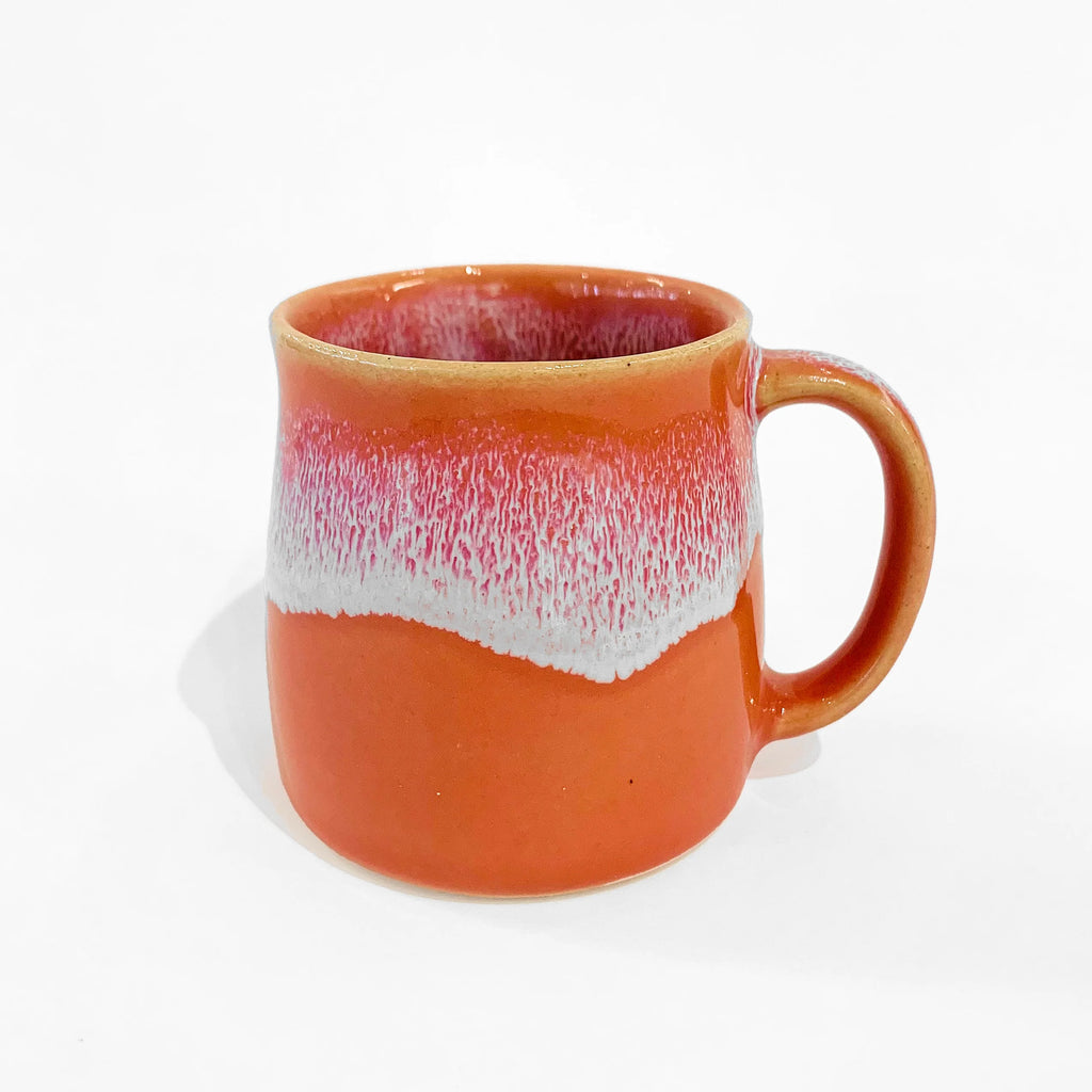 A Coral Pink Handmade Ceramic Mugster from Glosters Pottery for sale at Mostyn.