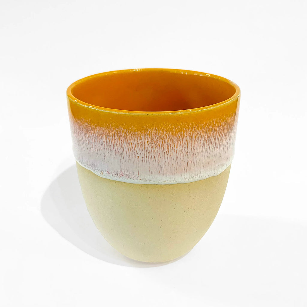 A Mustard Handmade Ceramic Drinks Tumbler from Glosters pottery for sale at Mostyn.