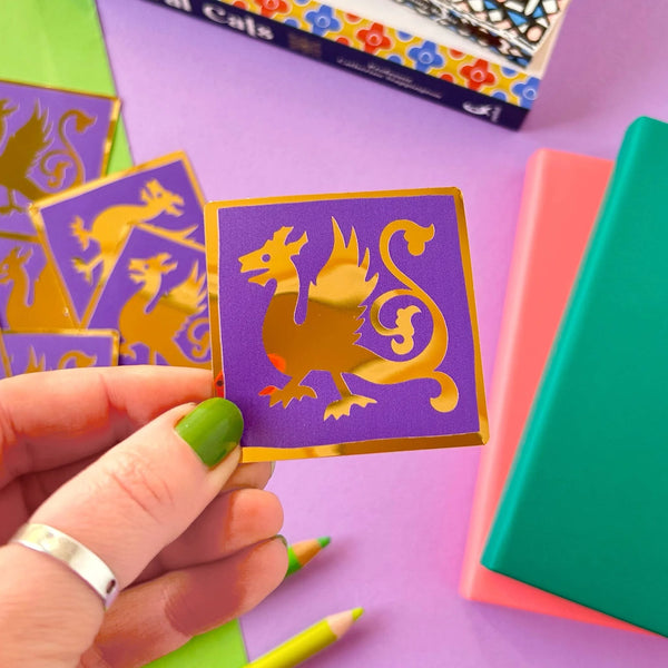 A Gold Foil Dragon Medieval Tile Sticker by Stacey McEvoy Caunt for sale at Mostyn