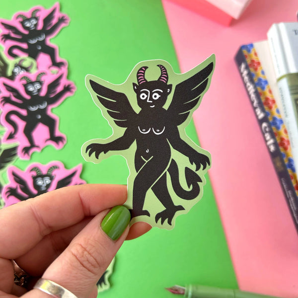 A Green Winged Devil Vinyl Sticker by Stacey McEvoy Caunt for sale at Mostyn