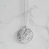 A Handcrafted Hammered Disc Eco-Silver Pendant Necklace from Jewellery by Jackie for sale at Mostyn.