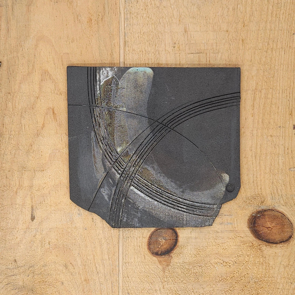Handcrafted  Vulcan Black Slab Ceramic Plate from Emily Hughes for sale at Mostyn