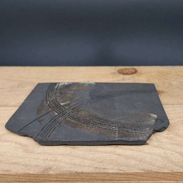 Handcrafted  Vulcan Black Slab Ceramic Plate from Emily Hughes for sale at Mostyn