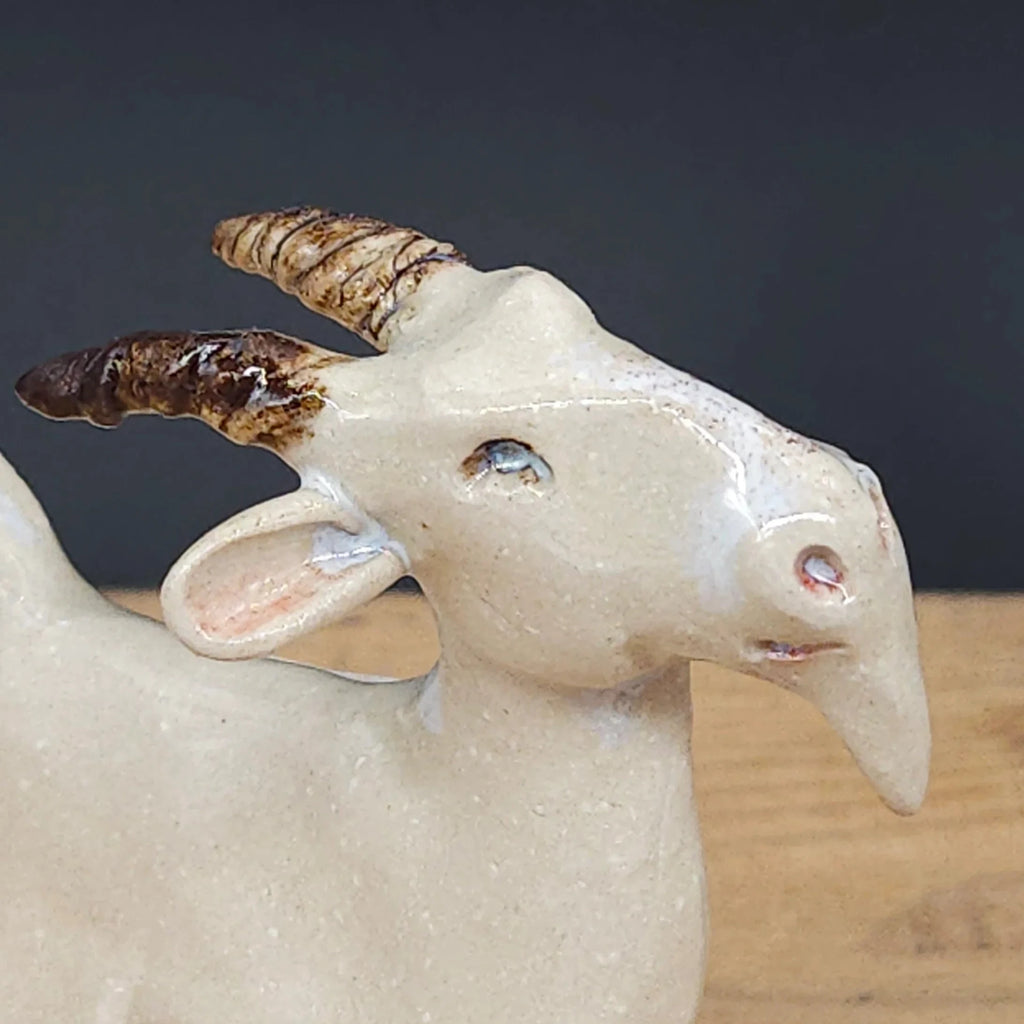Handmade Ceramic Cheeky Llandudno Goat from Louise Schrempft for sale at Mostyn