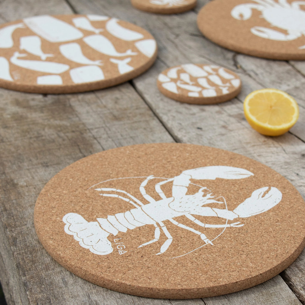 A Round Cork Placemat Set Lobster from Liga for sale at Mostyn.