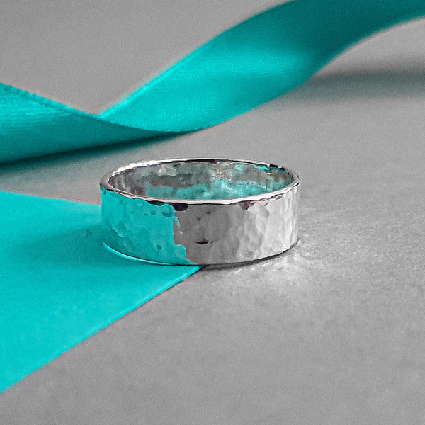 A Handcrafted Hammered Sustainable Eco-Silver Band Ring from Jewellery by Jackie for sale at Mostyn.