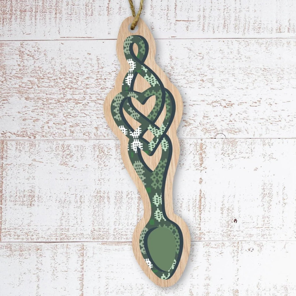 A Laser-cut Wooden Welsh Love Spoon Hanging Decoration from Max Rocks for sale at Mostyn.