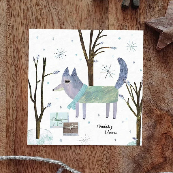Nadolig Llawen Wolf Wood Welsh Language Christmas Card from Paprwhale for sale at Mostyn