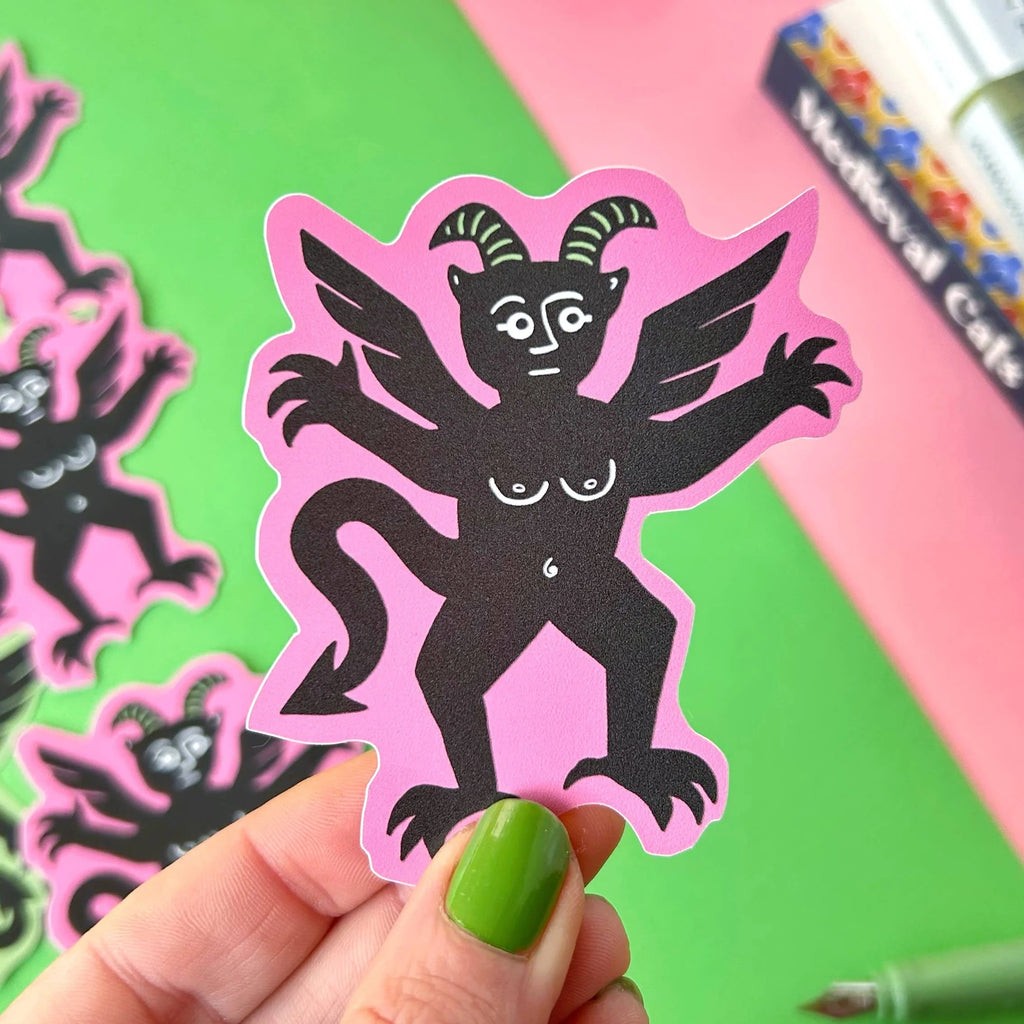 A Pink Winged Devil Vinyl Sticker by Stacey Mcvoy Caunt for sale at Mostyn
