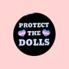 Protect_the_Dolls_Trans_Pride_Badge_by_Sent_with_pride for sale at Mostyn