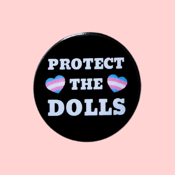 Protect_the_Dolls_Trans_Pride_Badge_by_Sent_with_pride for sale at Mostyn