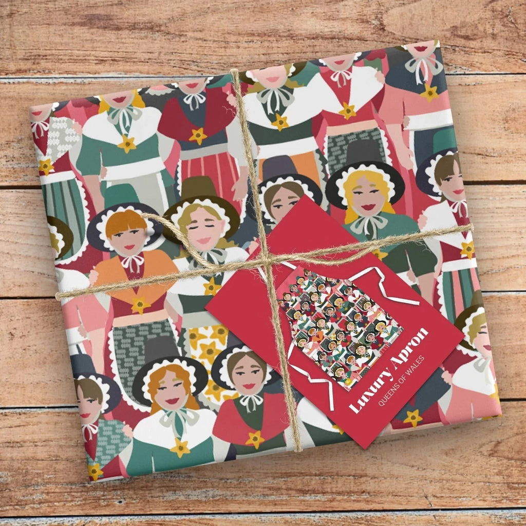 A Queens of Wales Welsh Lady Patterned Cotton Apron from Max Rocks for sale at Mostyn.