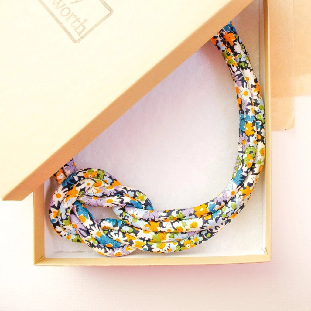 A Handcrafted Libby Liberty Print Fabric Reef Knot Necklace from Bunny Bosworth for sale at Mostyn