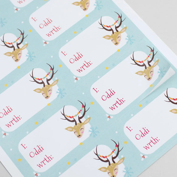Reindeer Welsh Language A4 Christmas Gift Tag Sticker Sheet from Oh!Susannah Welsh Gifts for sale at Mostyn