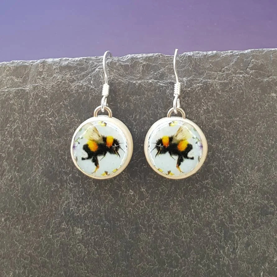Round Ceramic Earrings by NOA Jewellery for sale at Mostyn