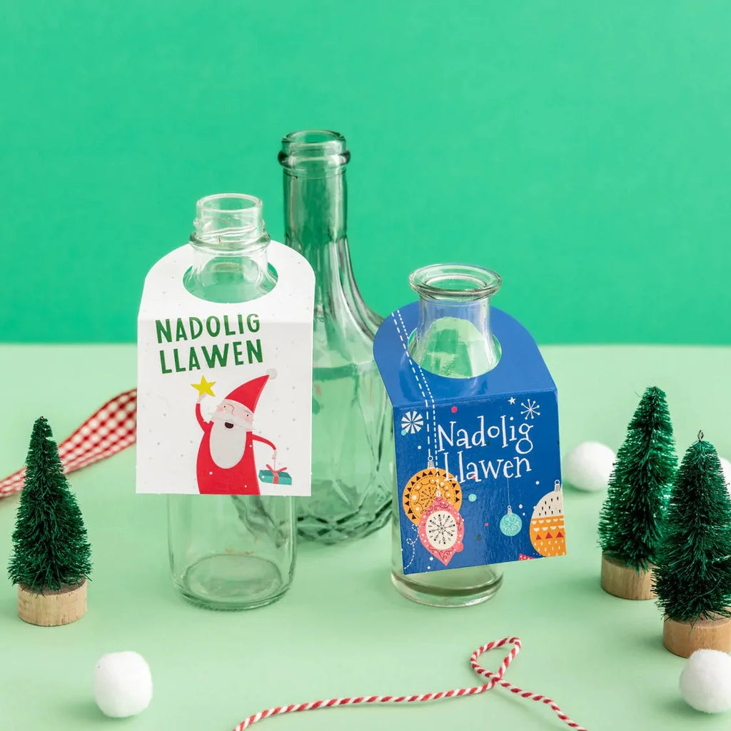 Set of 4 Father Christmas and Bauble Welsh Language Christmas Bottle Neck Gift Tags from Oh Susannah for sale at Mostyn