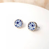 Stainless Steel Framed Round Ceramic Stud Earrings by NOA Jewellery for sale at Mostyn