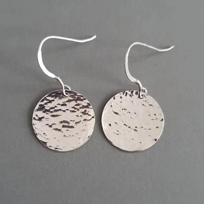 A Handcrafted Hammered Disc Eco-Silver Earrings from Jewellery by Jackie for sale at Mostyn.