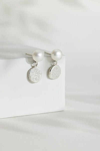 Sterling Silver Blobby Suspended from a White Pearl Stud Earrings from Rebecca Oldfield for sale at Mostyn