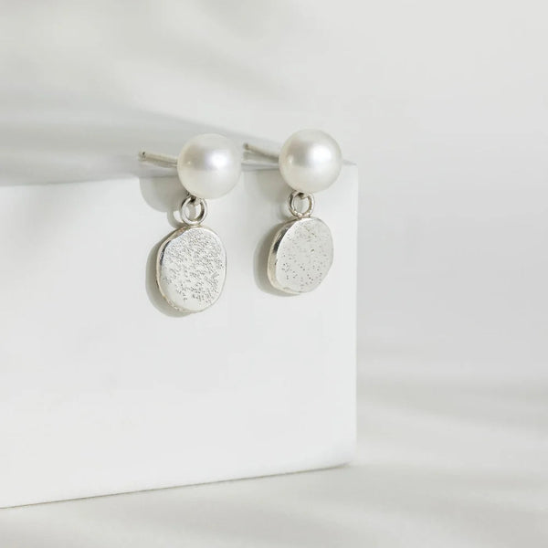 Sterling Silver Blobby Suspended from a White Pearl Stud Earrings from Rebecca Oldfield for sale at Mostyn