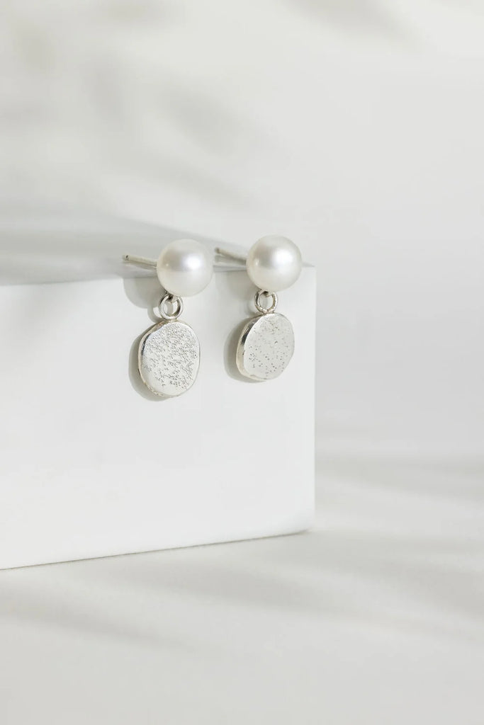 Sterling Silver Blobby Suspended from a White Pearl Stud Earrings from Rebecca Oldfield for sale at Mostyn