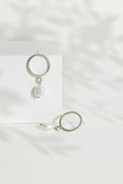 Sterling Silver Circle Stud Earrings with Drop Pearl from Rebecca Oldfield for sale at Mostyn