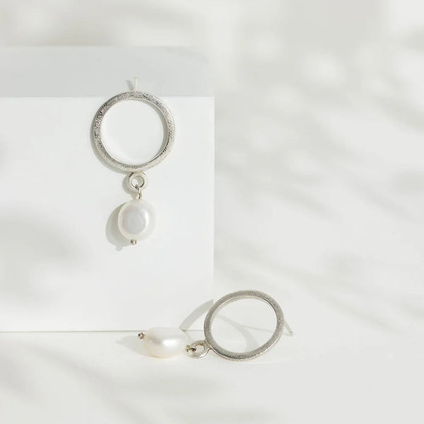 Sterling Silver Circle Stud Earrings with Drop Pearl from Rebecca Oldfield for sale at Mostyn