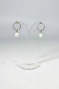 Sterling Silver Circle Stud Earrings with Drop Pearl from Rebecca Oldfield for sale at Mostyn