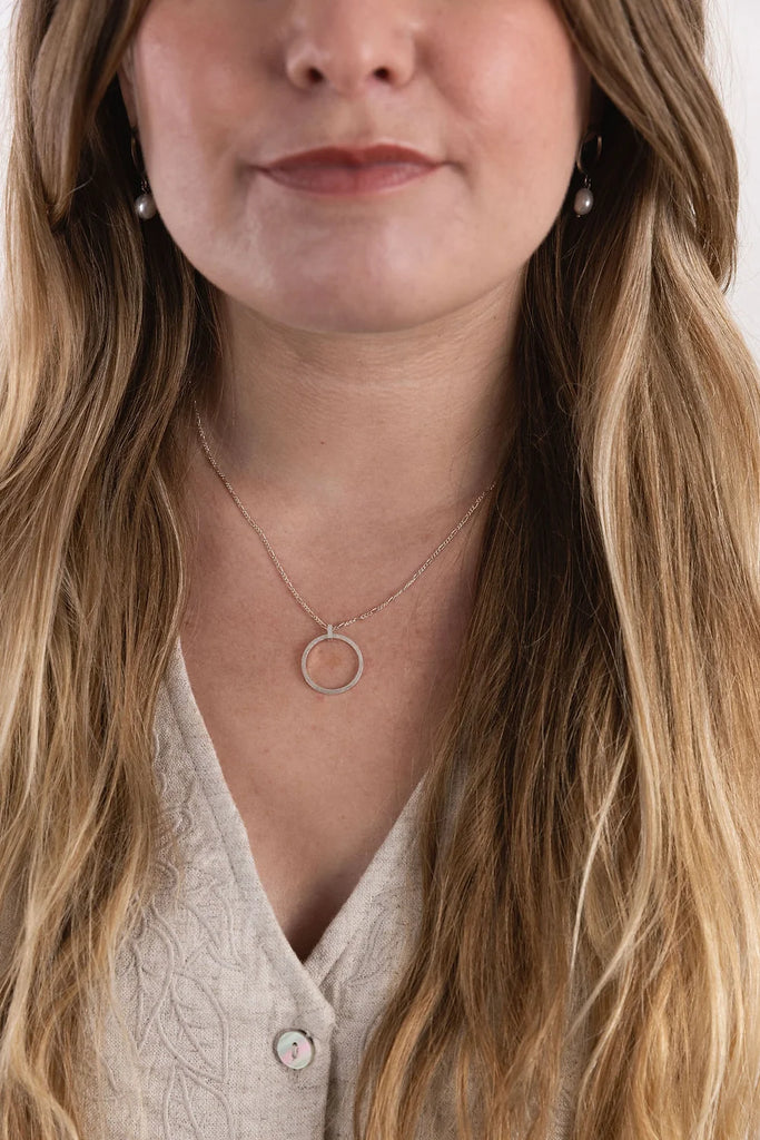 Sterling Silver Sparkle Effect Circle Necklace on an 18" Figaro Chain from Rebecca Oldfield for sale at Mostyn