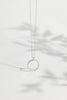 Sterling Silver Sparkle Effect Circle Necklace on an 18" Figaro Chain from Rebecca Oldfield for sale at Mostyn