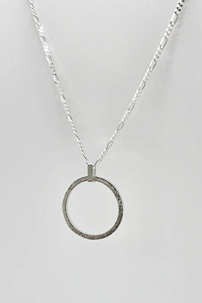 Sterling Silver Sparkle Effect Circle Necklace on an 18" Figaro Chain from Rebecca Oldfield for sale at Mostyn