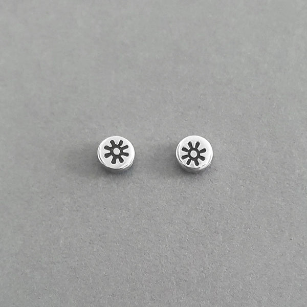 A Handcrafted Stamped Sun Motif Eco-Silver Stud Earrings from Jewellery by Jackie for sale at Mostyn.