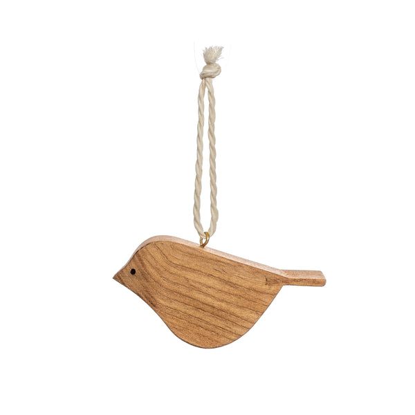 Crafted from bass wood this bird decoration has a whitewashed underside and hangs from yarn string.