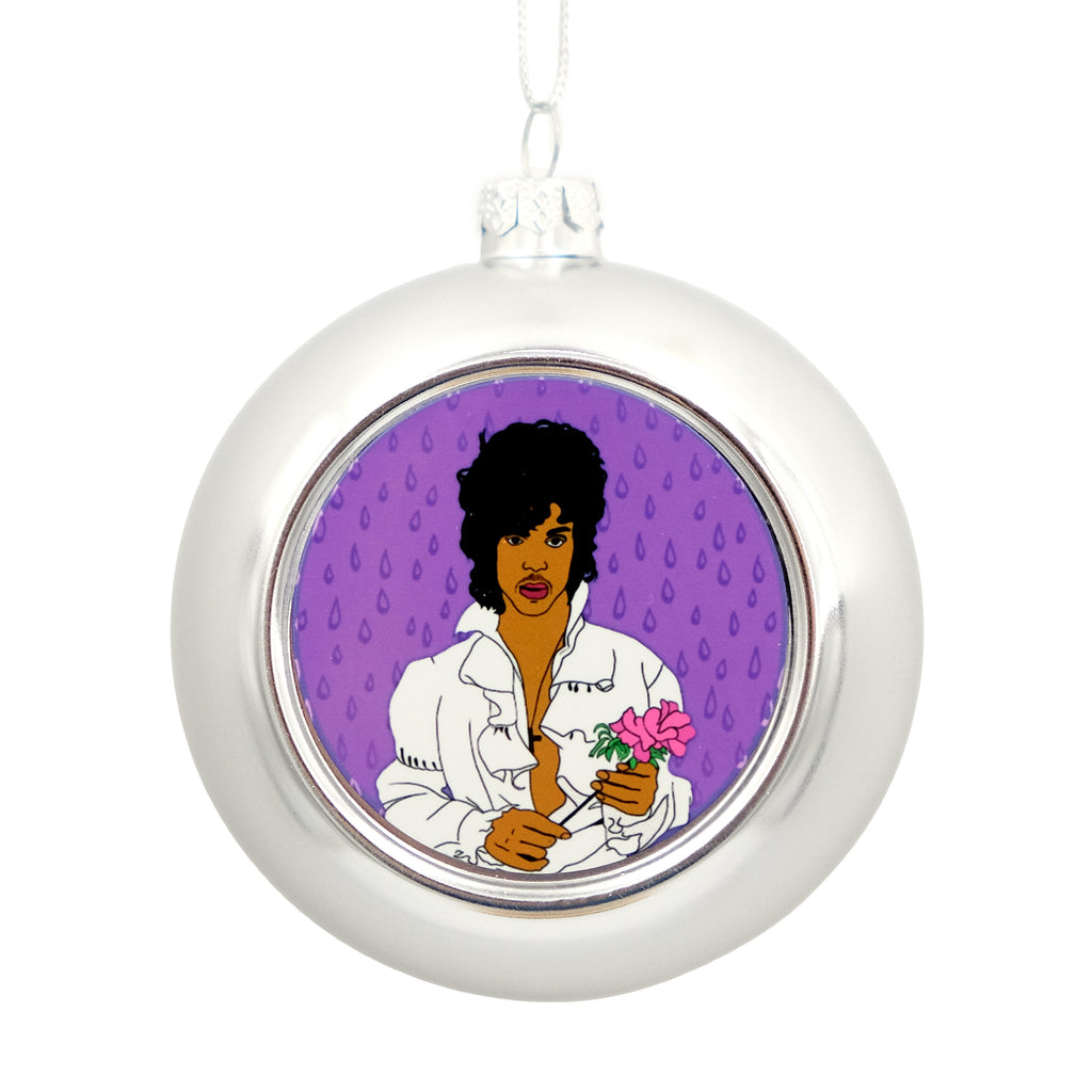 Metallic silver bauble with a printed disc on the front. The disc shows an graphic illustration of Prince.