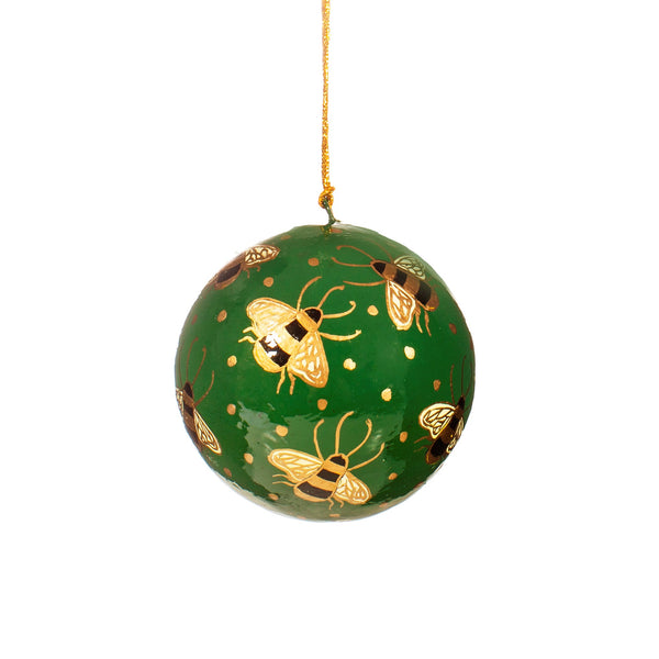 Bright and festive bauble adorned with hand painted bees. Colours are green and gold
