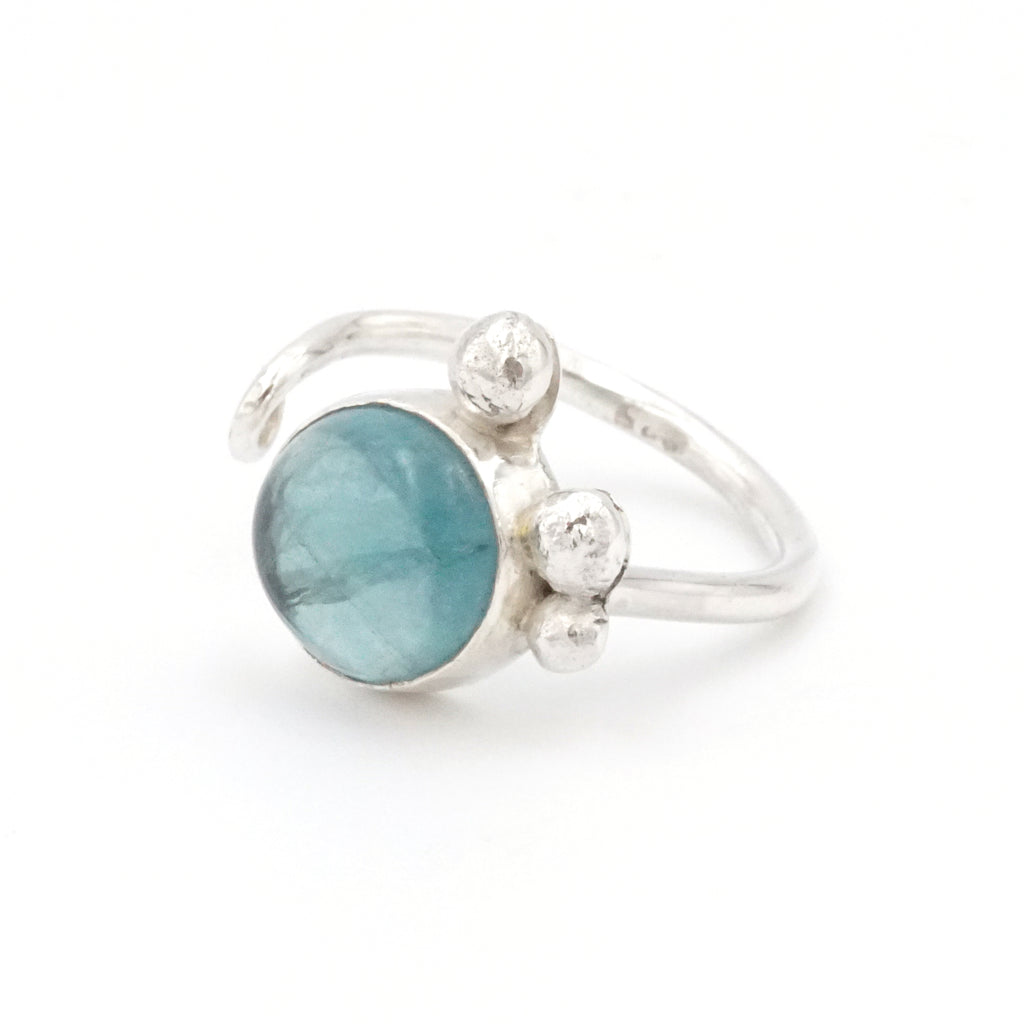 Sterling silver adjustable ring with fluorite feature. Made by Clarrie Flavell.