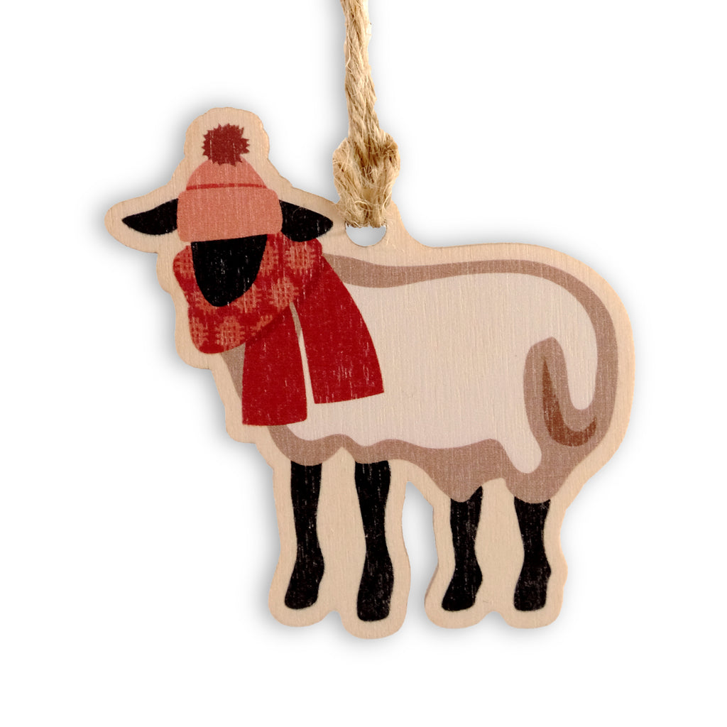 An Idris Festive Sheep Laser Cut Wooden Christmas Decoration from Max Rocks for sale at Mostyn
